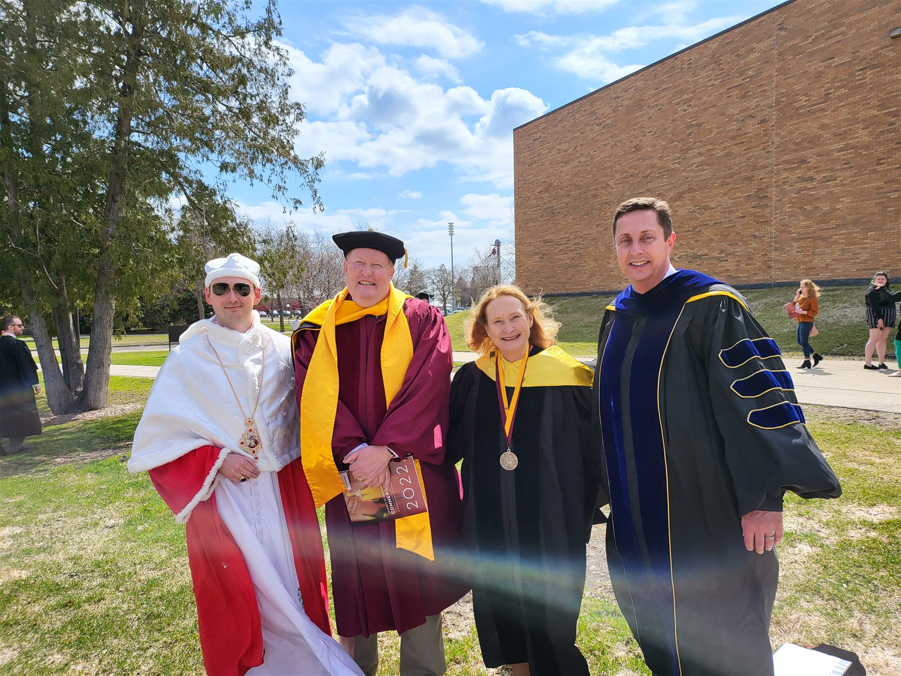Pope Radislav I with University of Minnesota leaders at the 2022 Crookston commencement